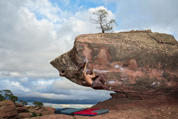 young man climbing