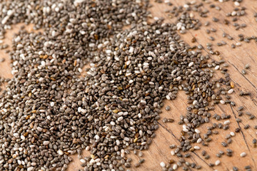 chia seeds on wooden surface