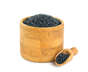 Fototapeta na wymiar black lentils in a bowl isolated on white