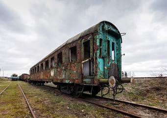 Fototapeta na wymiar Destroyed railway wagon