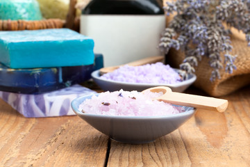 Obraz na płótnie Canvas Homemade Soap with Lavender Flowers and Sea Salt, on wooden back