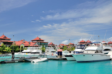 Fototapeta na wymiar Luxury yachts in marina of Eden Island, Seychelles.