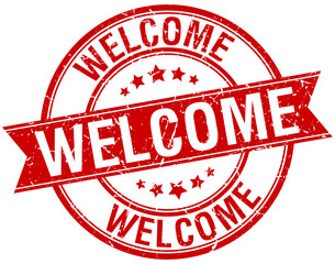 welcome grunge retro red isolated ribbon stamp