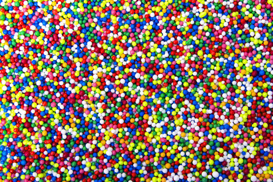 Fototapeta Mix of colorful Sugar balls powder background