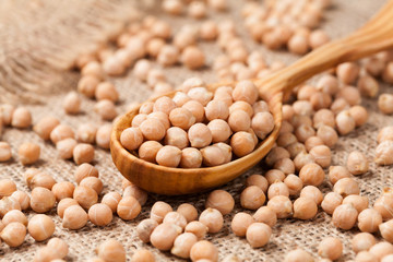 Raw chick peas organic vegetarian nutrition super food in wooden