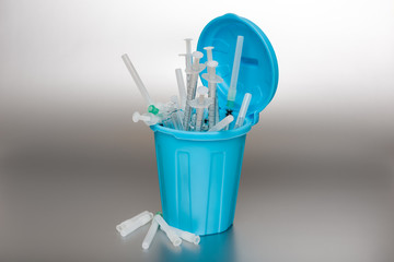 Blue Garbage can with medical waste