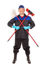 Cleaner in uniform with broom and mop