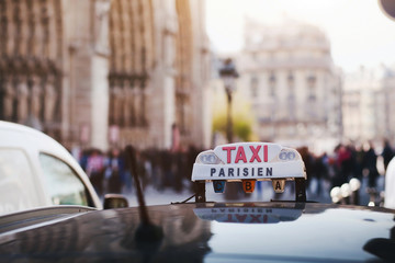 taxi parisien, sign Taxi on the roof of the car in Paris