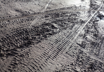 Wheel tracks on the dirt road