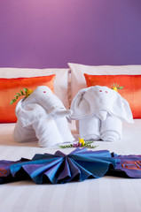 Bedding elephan origami towel on the bed