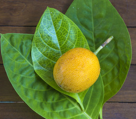 Passion Fruits on Wooden Background