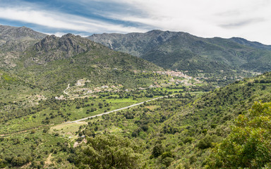 N197 road heads towards the coast in Corsica