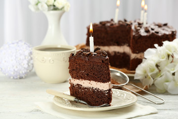 Delicious chocolate cake on table on light background