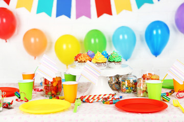Prepared birthday table with sweets for children party