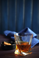 Whiskey on wooden background