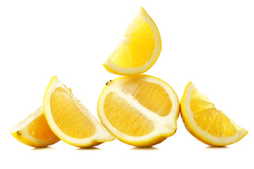 Juicy slices of lemon isolated on white