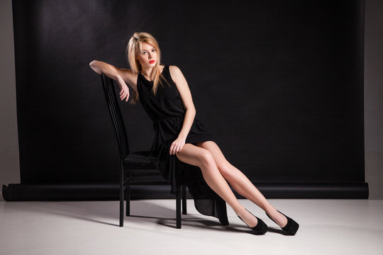 Image of  luxurious woman sitting on  chair