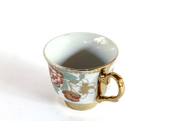 Elegant Antique china tea cup and saucer on white background