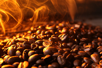 Pile of coffee beans with steam, closeup