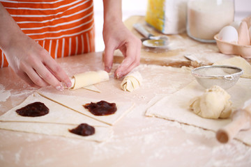 Making croissant cookies.