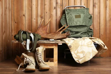 Rolgordijnen Hunting gear on wooden background © Africa Studio