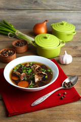 Mushroom soup on wooden background