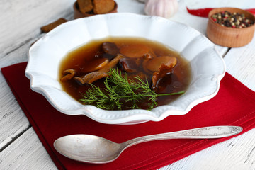 Mushroom soup on wooden background