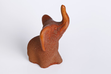 elephant figurine on a white background