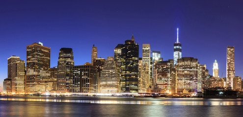 Fototapeta na wymiar New York City Manhattan midtown at dusk with skyscrapers illumin