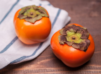 two persimmons