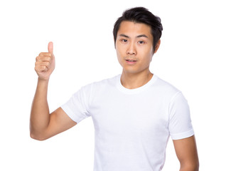 Asian young man with thumb up gesture