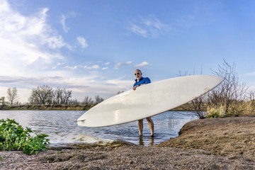launching stand up paddleboard
