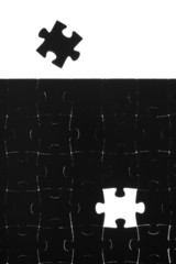Black puzzle on a white background