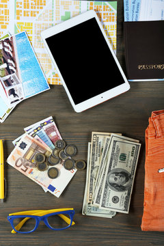 Set of travel things on wooden background