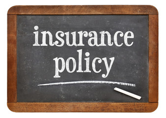 insurance policy text on blackboard