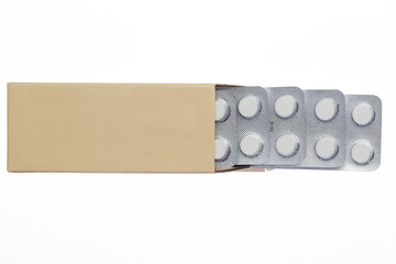 Grey box with white pills blister pack