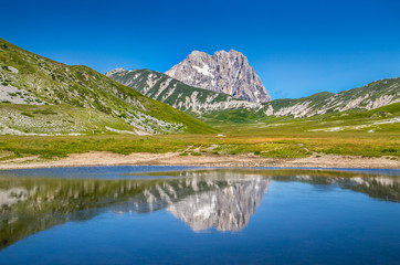Gran Sasso mountain lake reflection, Campo Imperatore, Italy