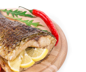 Grilled carp with lemon