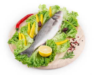 Composition of fresh seabass and vegetables.