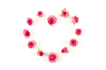 Heart shaped rose flower on white background