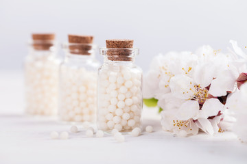 Fototapeta na wymiar homeopathic pills
