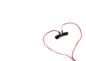 red earphone setting in heart shape and spacing for caption