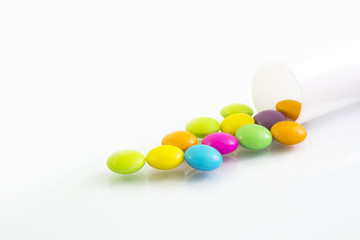 pouring candy to the ground, isolated