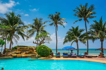 Pool and palms on sea shore. Thailand, Koh Chang,