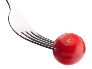 Cherry tomato on fork isolated on white background cutout. Healt