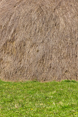 Haystack and grass background