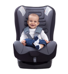 Smiling infant baby boy sitting in a car seat, isolated on white © didesign