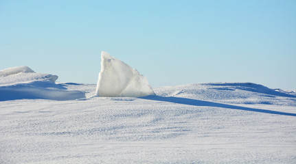 Sunny polar landscape- frozen sea at the sunny day