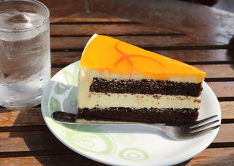 Cake slice and sweet orange