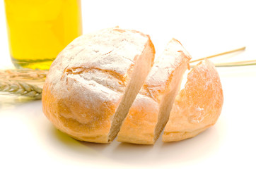 fresh bread and wheat on white